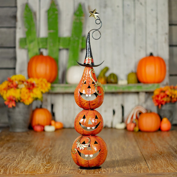 31 inch hand painted metal jack-o-lantern totem tower with stacked funny pumpkin faces in orange and black