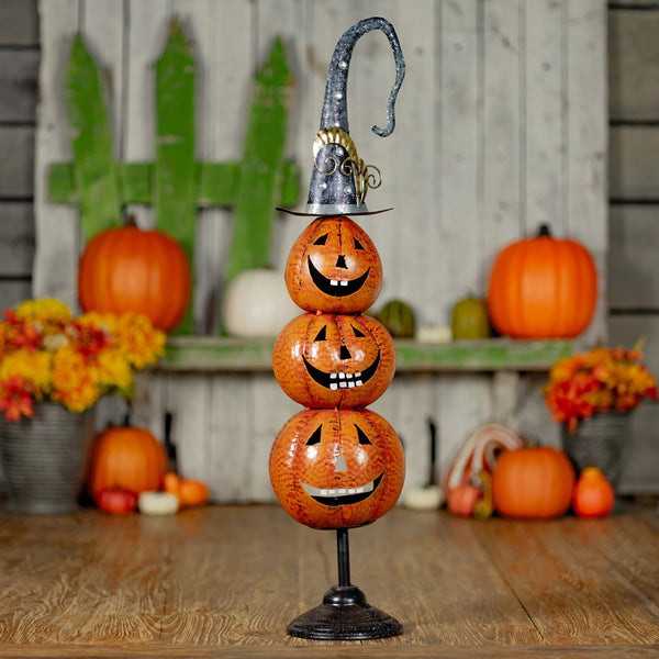 32.75 inch hand painted metal jack-o-lantern totem tower on a stand, orange and black