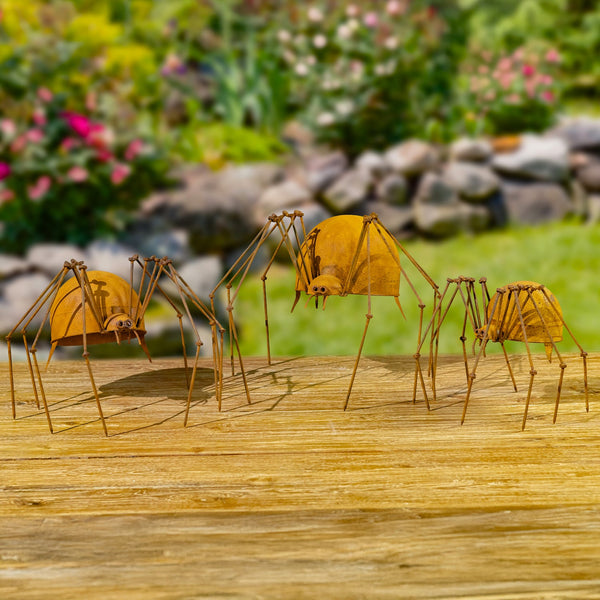 Set of three iron spider garden figurines in small, medium, and large with a hand painted rust finish
