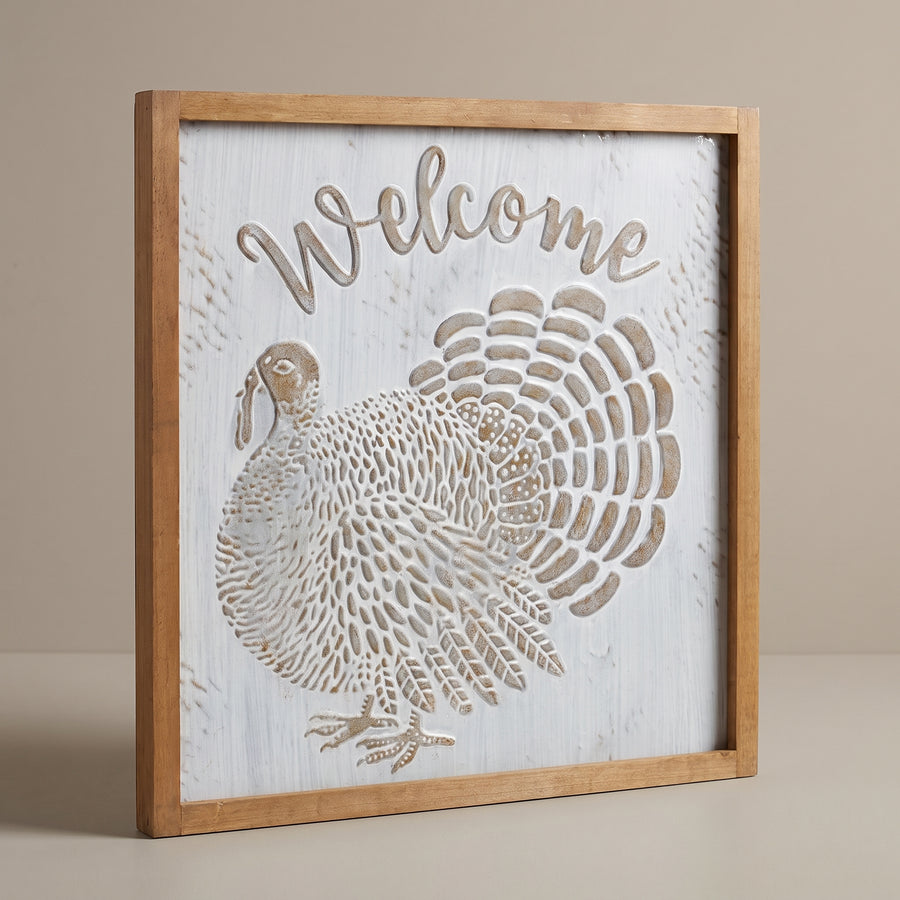 Twenty-inch square welcome turkey sign with a fir wood frame and white-washed metal turkey panel, raised studio angle on a plain surface