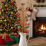 Multicolor sleigh bell Christmas sprays in a white pitcher in a traditional living room with a lit tree