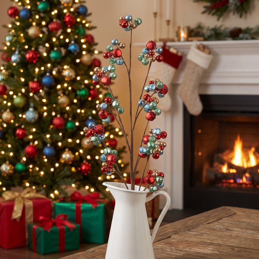 Multicolor sleigh bell Christmas sprays in a white pitcher in a traditional living room with a lit tree