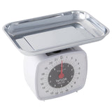 Taylor 3880 white analog kitchen scale with stainless steel tray, angled view of the dial