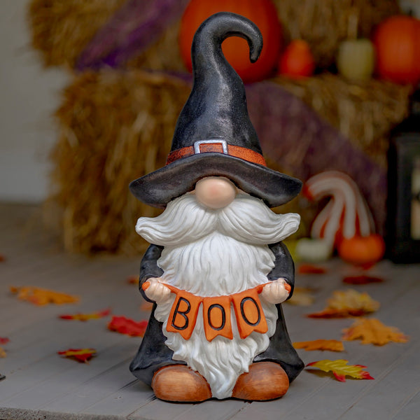 Hand painted Halloween garden gnome witch holding a BOO sign